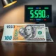 Singapore dollar and US dollar banknotes on a desk with a digital exchange rate screen in the background.