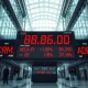Stock market board showing red declines for major software companies