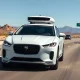 Waymo autonomous vehicle driving on a Phoenix freeway during daylight