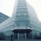 Apollo Global Management headquarters building under overcast sky, symbolizing the confirmed data breach.