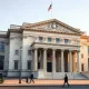 US Treasury Building in Washington, DC, on a clear day, symbolizing the department's bond buyback policy.