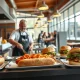 Dog Haus restaurant interior with staff preparing gourmet hot dogs and burgers