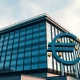 European Central Bank headquarters in Frankfurt on a clear morning, symbolizing Euro strength against the US Dollar.