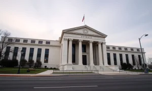 Federal Reserve building in Washington, D.C. on a cloudy day