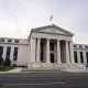 Federal Reserve building in Washington, D.C. on a cloudy day
