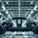 Electric vehicle chassis on an assembly line in a modern automotive factory
