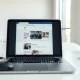 Laptop with browser interface and cursor, representing Hark's Handoff browser-use AI agent