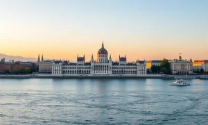 Hungarian Parliament Building in Budapest at dawn, symbolizing the country's economic outlook.
