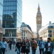 Modern office buildings and professionals in King's Cross, London, now a leading AI hub