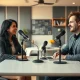 Claire Zau and Josh Machiz recording the Lightwork podcast in a modern studio