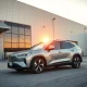 Lucid Gravity SUV parked outside the company's Casa Grande, Arizona factory at sunset.