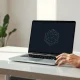 Laptop with on-device AI processing representation in a modern office setting