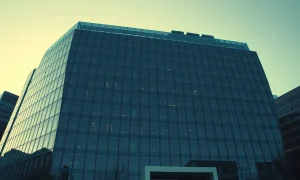 Exterior of a modern tech office building, representing Meta's headquarters, under a clear sky.