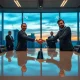 Nvidia and Hugging Face executives shaking hands in a modern boardroom