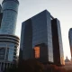 Warsaw financial district skyline with the Palace of Culture and Science at sunset