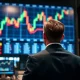 Financial analyst watching an upward trending GBP/USD chart on a trading floor display