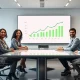 Executives reviewing an AI cost dashboard in a modern boardroom