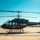 Robinson R66 helicopter on tarmac at Army flight training facility