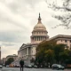 US Capitol building with subtle financial charts overlay, representing economic forecast