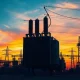 High-voltage power transformer at an electrical substation in the U.S., central subject of Trump's executive order on foreign grid equipment.