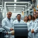 Engineers inspecting battery material production line in a US manufacturing facility