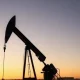 Oil pumpjack in the Williston Basin at dusk, representing Vitesse Energy's non-operated oil and gas strategy.