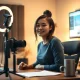 Content creator filming in a home studio with professional lighting and camera equipment