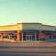 Modern retail property representing Alpine Income Property Trust real estate holdings