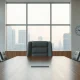 Empty executive chair in a corporate boardroom reflecting Automattic leadership vacancy