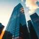 Financial district skyline with digital network overlays representing AI-driven equity market growth