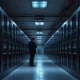 Dark data center aisle with blue-lit server racks and an engineer checking a tablet
