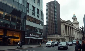 City of London financial district skyline on an overcast day, representing UK economic outlook.