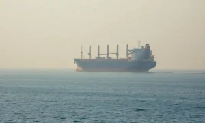 A crude oil tanker transits the Strait of Hormuz as seen from the Musandam coast of Oman