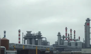 Storage tanks and pipework at the Stanlow Petrol Refinery in Ellesmere Port, England